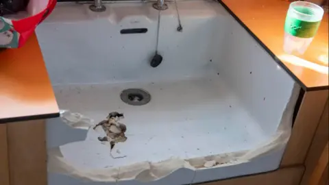 City of Wolverhampton Council A sink is smashed and damaged at one of the schools.