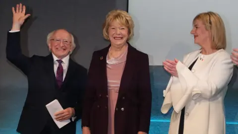 PA Sinn Féin candidate Liadh Ní Riada applauds Michael D Higgins on his win