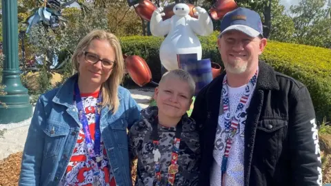 Family handout Kerry and Mike Askin with their son