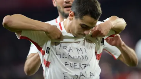 Getty Images Sevilla's Wissam Ben Yedder showing a message to Emiliano Sala on his T-shirt