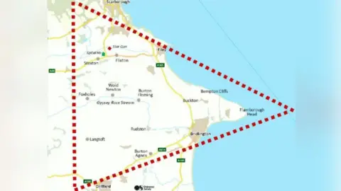 Kloskk Tyrer A map of East Yorkshire showing a red dotted line in the shape of a triangle on its side, which depicts the area covered by the Wold Newton Triangle.