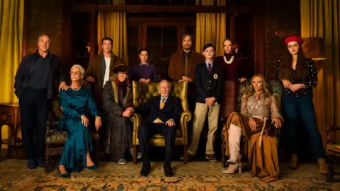 Lionsgate Christopher Plummer (seated front) with his fellow Knives Out cast members