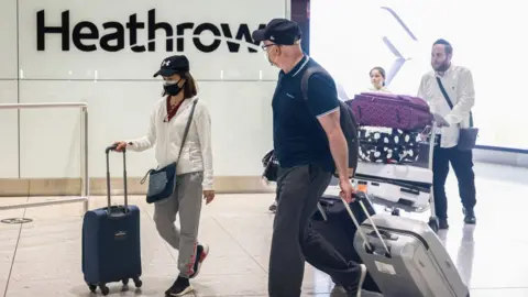 Getty Images Passengers at Heathrow