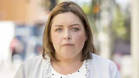 PA Media Communities Minister Deirdre Hargey