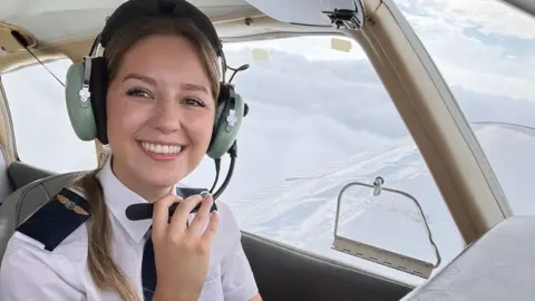 Lily Ayres Lily Ayres flying a plane