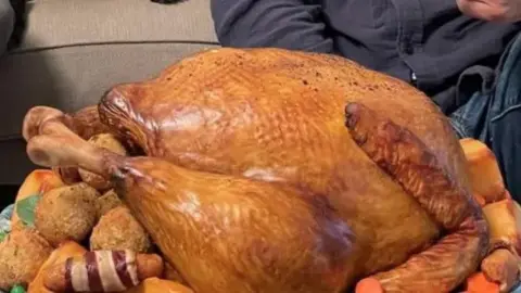 Owl Power Ltd A cake which looks like a roast turkey with all the trimmings