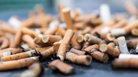 Getty Images Pile of cigarette butts