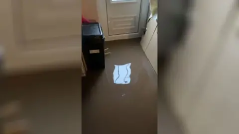 Sarah Brackstone Flooding at Sarah Brackstone's neighbours house