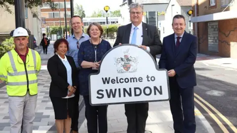 Swindon Borough Council From left to right: Ashley Hepper (contractors Britannia), Laura Jones (Council's Project Manager), Jamie Adkins (Atkins), Cllr Maureen Penny (Cabinet Member for Highways and the Environment), Cllr David Renard (Leader of the Council), Cllr Gary Sumner (Cabinet Member for Strategic Planning)