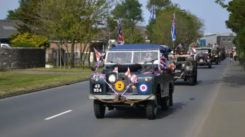 cars in Guernsey liberation day cavalcade