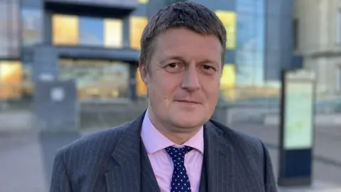 BBC Council leader outside County Hall