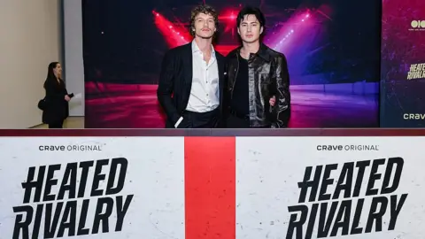 Getty Images Connor Storrie and Hudson Williams attend the premiere of "Heated Rivalry" at TIFF Lightbox on November 24, 2025 in Toronto, Ontario