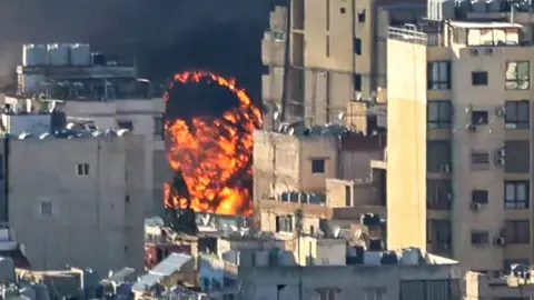 Smoke plumes billow following Israeli bombardment on Beirut's southern suburbs on March 2, 2026. 