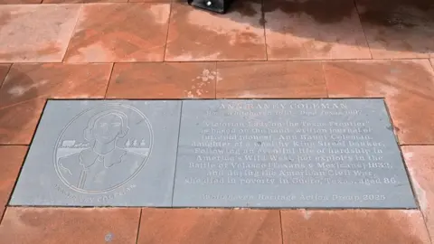 Cumberland Council The memorial flagstone to Ann Raney Coleman made of slate and etched with image of Ann Raney and some words remembering who she was.