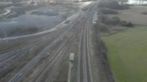 Mark Dodd/BBC Overhead shot showing the railtracks at Ely junction.