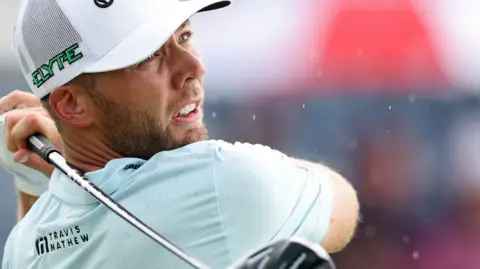 Sam Burns hitting a tee-shot with his driver