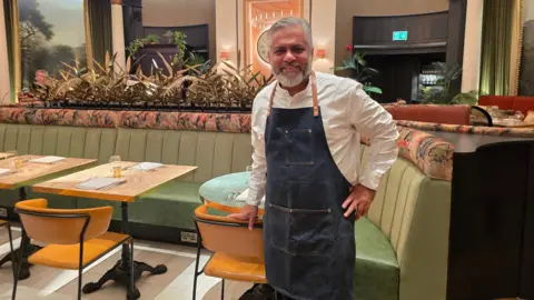 Hayley Coyle/BBC A chef in his restaurant