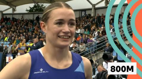 Phoebe Gill reacts after earning a Team GB spot at the Olympics