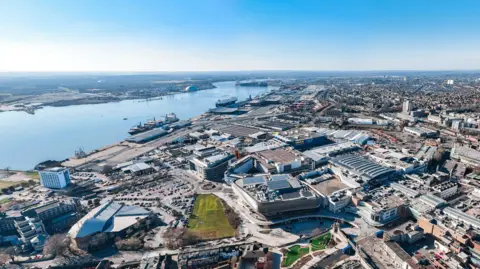 Aerial of Southampton city with the New Forest in the distance