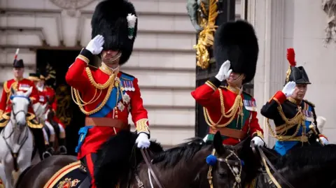 Getty Images Prince William, Prince Edward and Princess Anne in full military regailia, riding on horseback