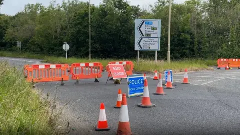 BBC A326 road sign and police closure