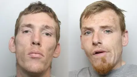 Two mugshots side by side. Both men appear tired and run down. Welsh has short blond-ginger hair, a long face, stubble on his chin and large ears. Shaw also has blond-ginger hair, and a ginger goatee and blue eyes. His jaw is to the side and mouth slightly open as though he is speaking or chewing.