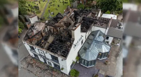 The Tap and Run The Tap and Run, in Upper Broughton, Nottinghamshire, destroyed in fire