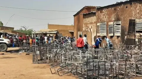 Tchima Illa Issoufou/BBC The burnt-out scene at the school in Niger - Wednesday 14 April 2021