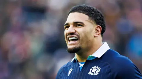 Scotland captain Sione Tuipulotu in action