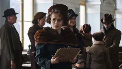 Warner Bros Helena Bonham Carter playing Sir Nicholas' mother - still from the film