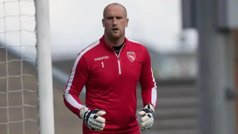 Morecambe's goalkeeping coach Barry Roche 