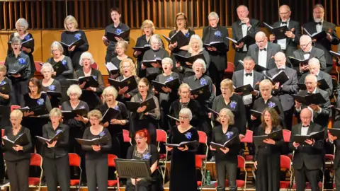 Matthew Clarke Ipswich Choral Society performing at Ipswich Corn Exchange in 2023