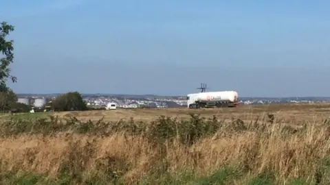 Fuel tankers accessing the site through fields