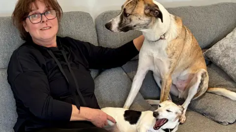 With her lurcher Tigger and Jack Russell Brodie to keep her company, Sarah has been spending time recuperating at her daughter's house.