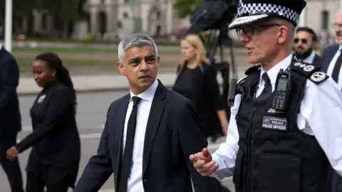 PA Media Mayor of London Sadiq Khan with Metropolitan Police Commissioner Sir Mark Rowley