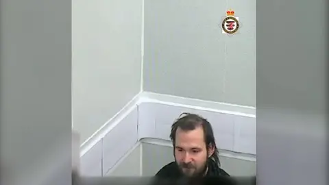 Man in police interview room