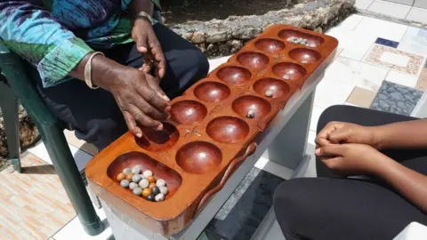 Close-up of a Warri board