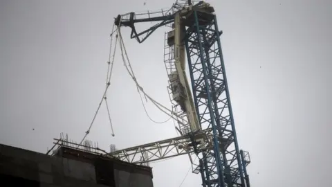 Reuters Broken crane is pictured in downtown Miami