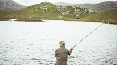 Cavan Images Pensioner fishing