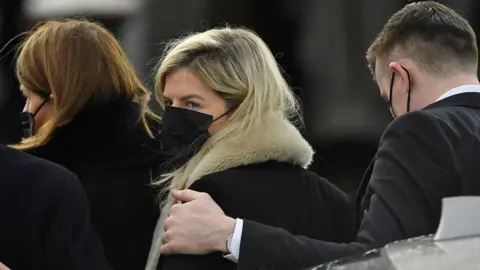 Reuters Mother and daughter hug