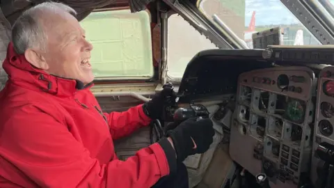 John Orminston in cockpit of RAF plane