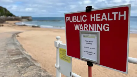 Warning sign at Grève de Lecq