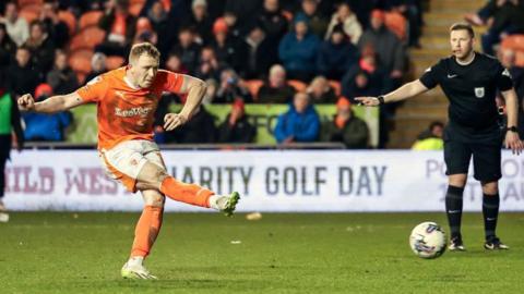 Shayne Lavery taking a penalty for Blackpool