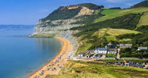Getty Images Image of a small hamlet near a sandy beach and blue sea