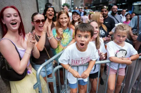 Reuters Taylor Swift fans gather outside of Madison Square Garden, the venue for the reported wedding celebrations of singer Taylor Swift and National Football League (NFL) player Travis Kelce, in New York, U.S., July 3, 2026.
