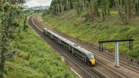 PA Media Photo of a GWR train with a city in the background