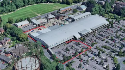 Google An aerial picture of the two units on the edge of Salisbury and the affected car park where the proposed Lidl would be created