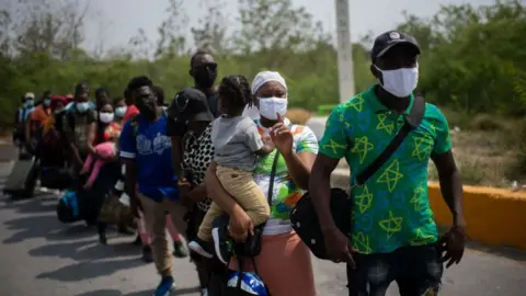 Getty Images Haitian migrants at the US-Mexico border