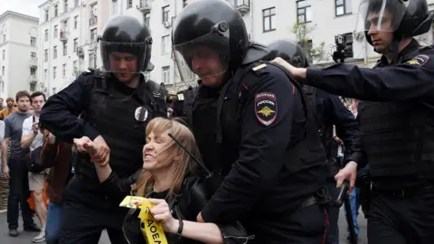 AFP Russian police officers detain Maria Baronova of Open Russia at the opposition rally in Tverskaya street in central Moscow