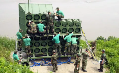 Getty Images Army engineers assemble a huge speaker stack near the DMZ.